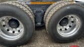 Heavy-duty truck rear axle and tires for Volvo FH model.