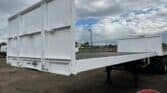 Afrit 6m front link flat deck trailer for heavy-duty transport. Perfect for construction and logisti.