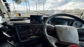 Interior view of a 2021 Volvo FH440 6X4 T/T truck cab, showcasing dashboard and steering wheel.